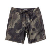 Exploring the unknown with Roark - camouflaged adventure gear in natural surroundings.