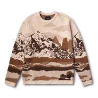 Stunning alpine landscape blanketed in snow with towering summit and glacial landforms, epitomizing Roark's passion for adventurous winter exploration.