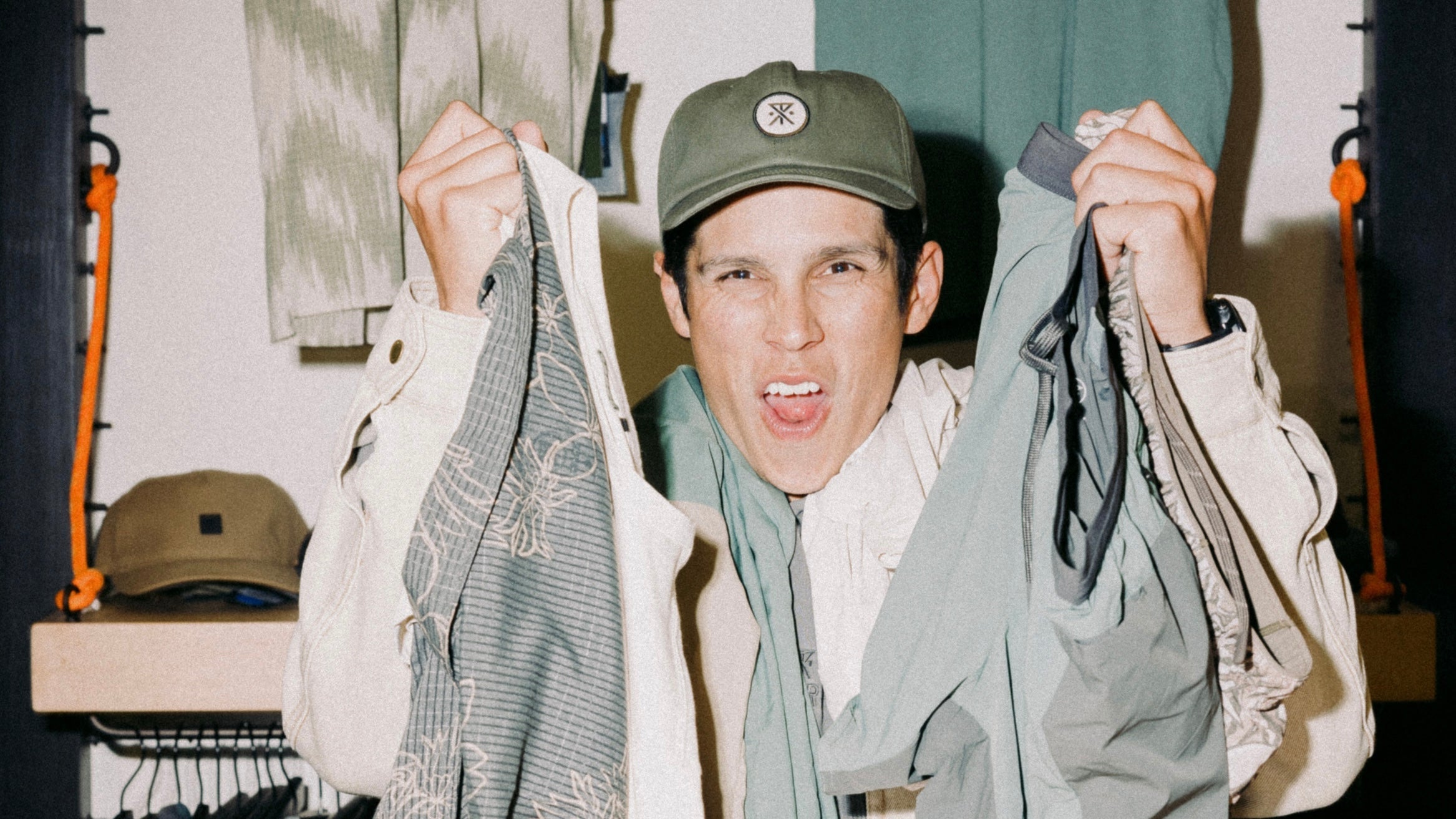 ethan holding up product