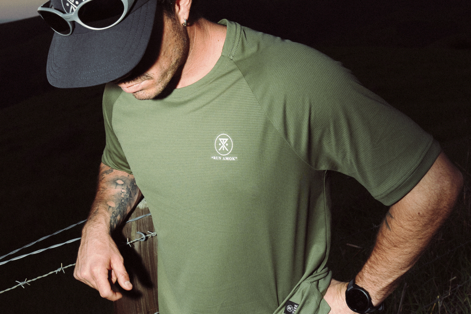 Roark branded active shirt and baseball cap featuring prominent logos, ideal for outdoor adventures and travel.