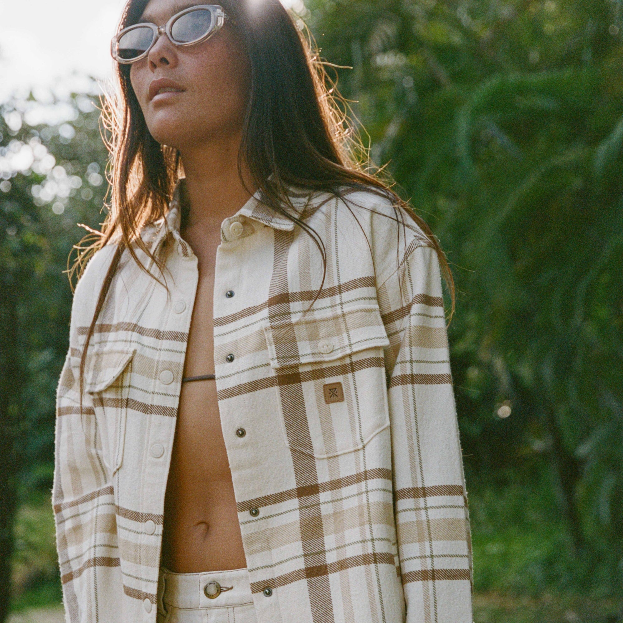 Cozy plaid flannel shirt, perfect for adventure and outdoor travel, from Roark's Amberley collection