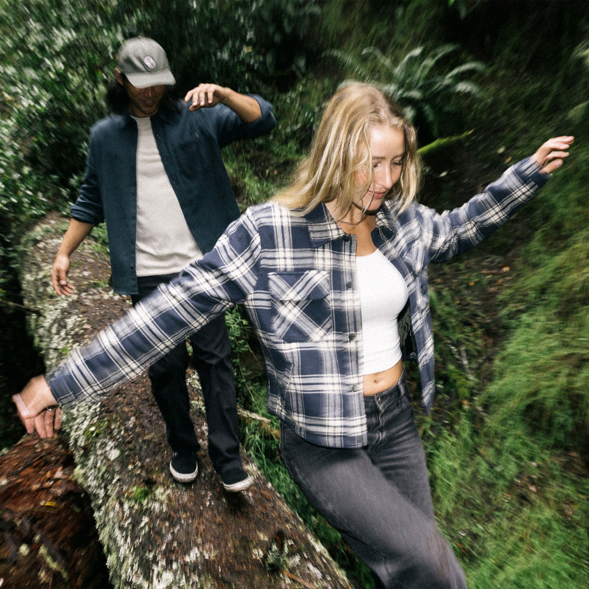 Roark Backwoods Jacket in tartan plaid paired with rugged denim jeans for outdoor adventure