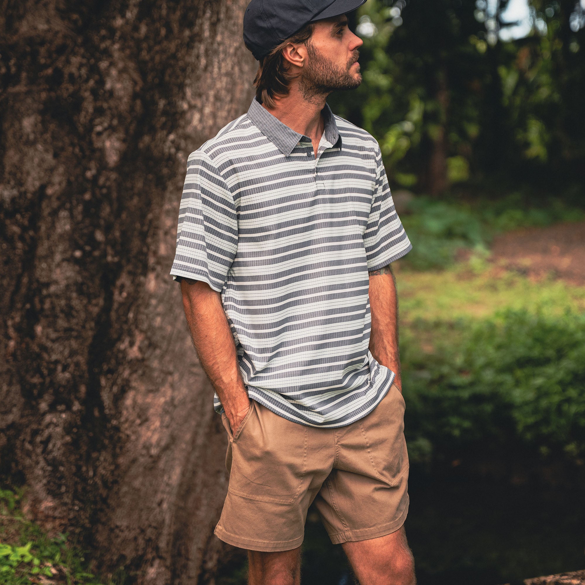 Adventure-ready Bless Up Polo with cap and collar details, featuring a practical pocket for outdoor explorations