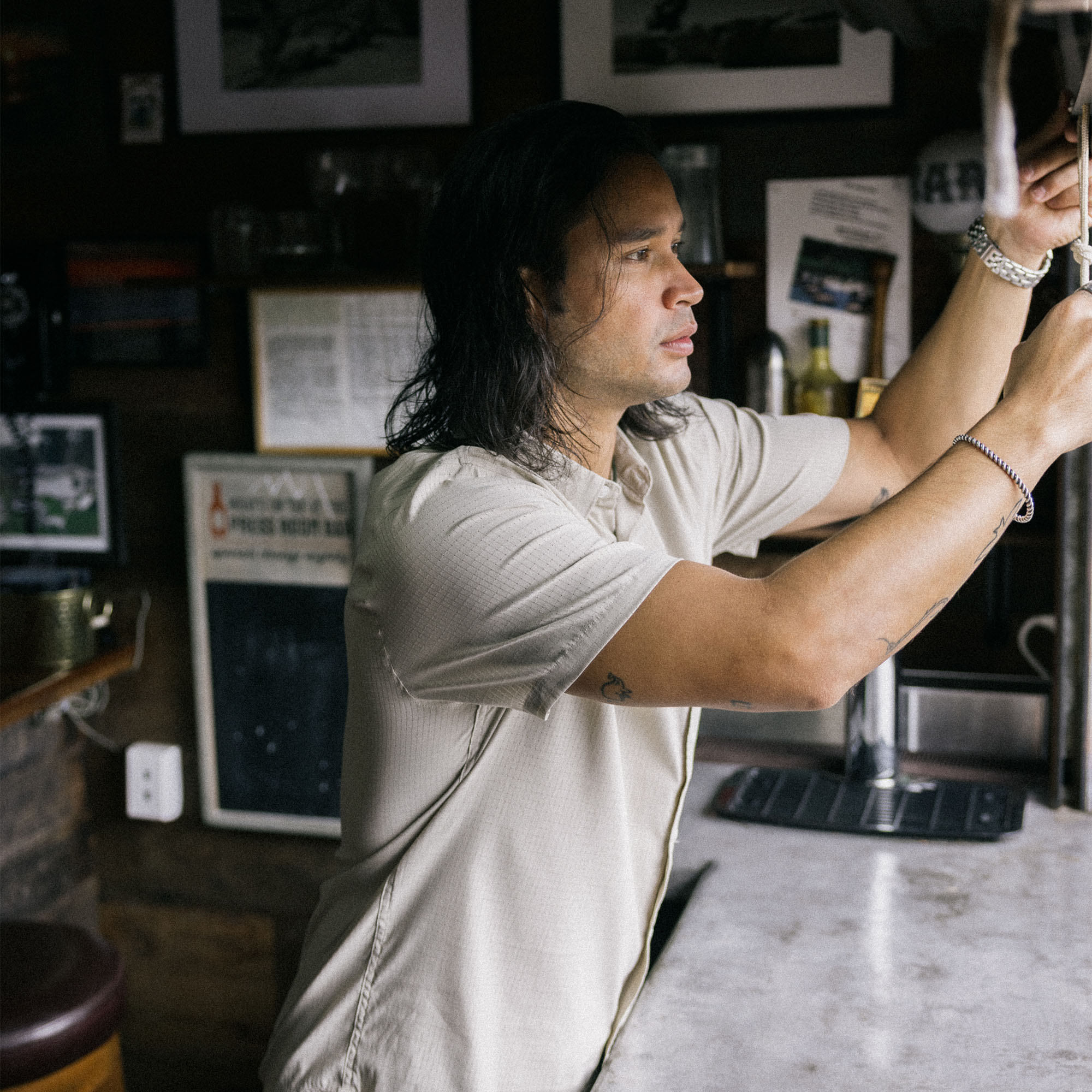 Active shirt from Roark's HO25 collection featuring a microphone stand, perfect for adventurous musicians and travelers.