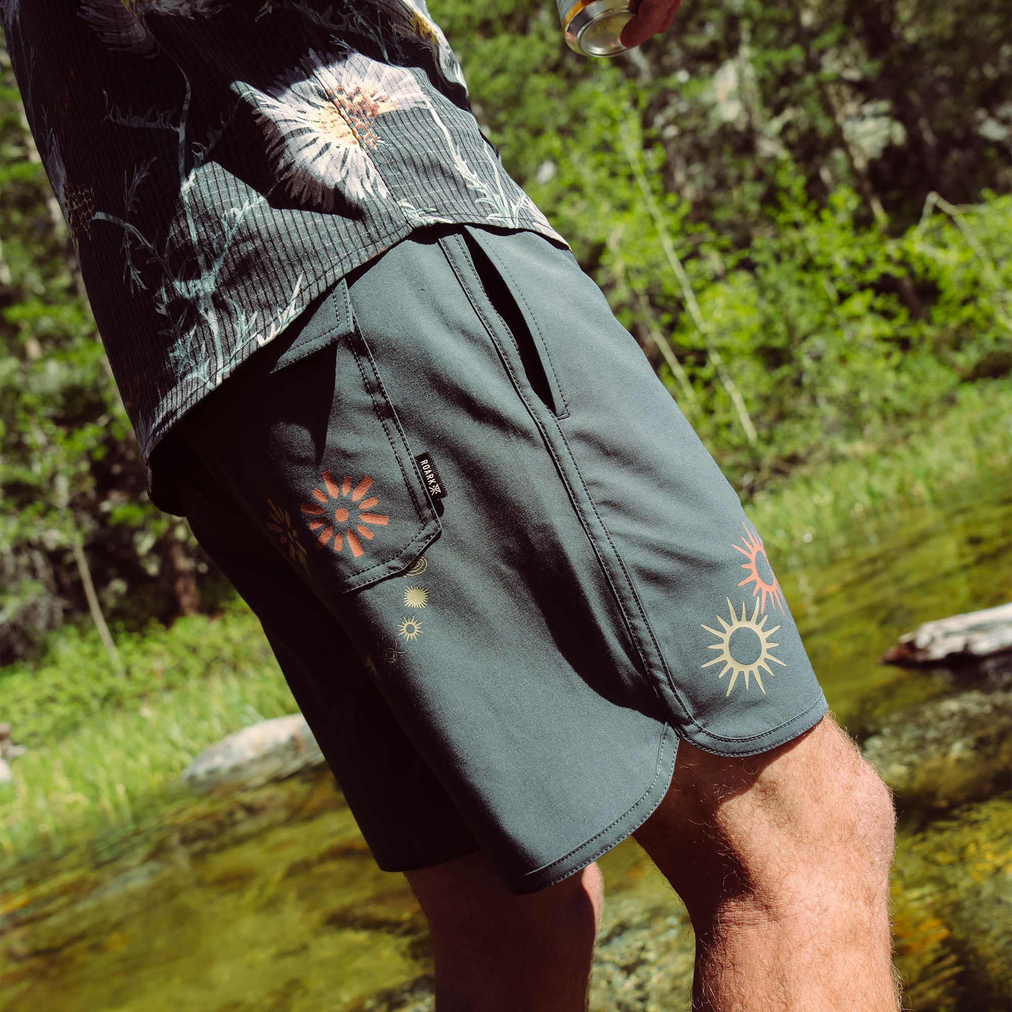 Assorted Roark Chiller Boardshorts laid out showcasing their vibrant patterns and durable design, perfect for adventure and travel.