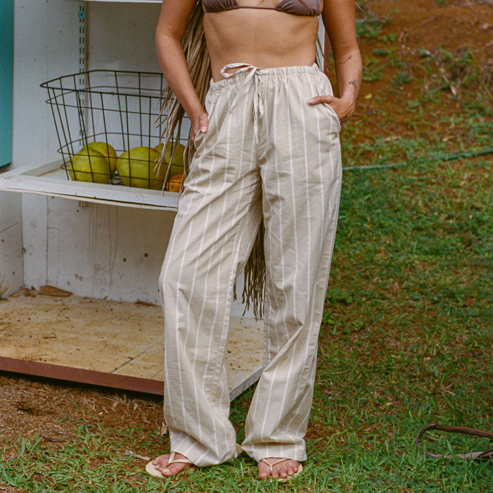 Versatile Costa pants by Roark, styled as relaxed nightwear or casual pajamas, perfect for outdoor lounging and unwinding after adventures.