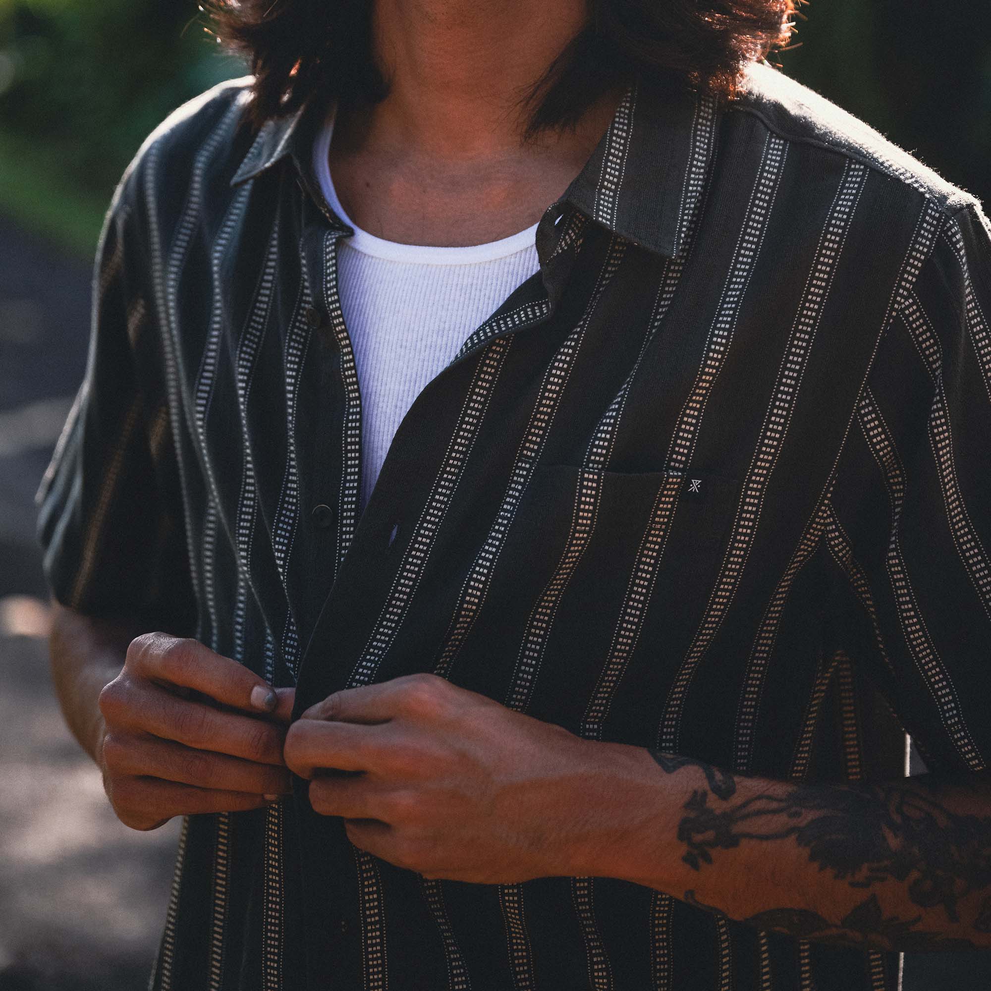 Stylish Roark Crosswinds Button Up Shirt featuring a prominent collar, secure buttons, and crisp sleeves, perfect for both adventure and casual wear.