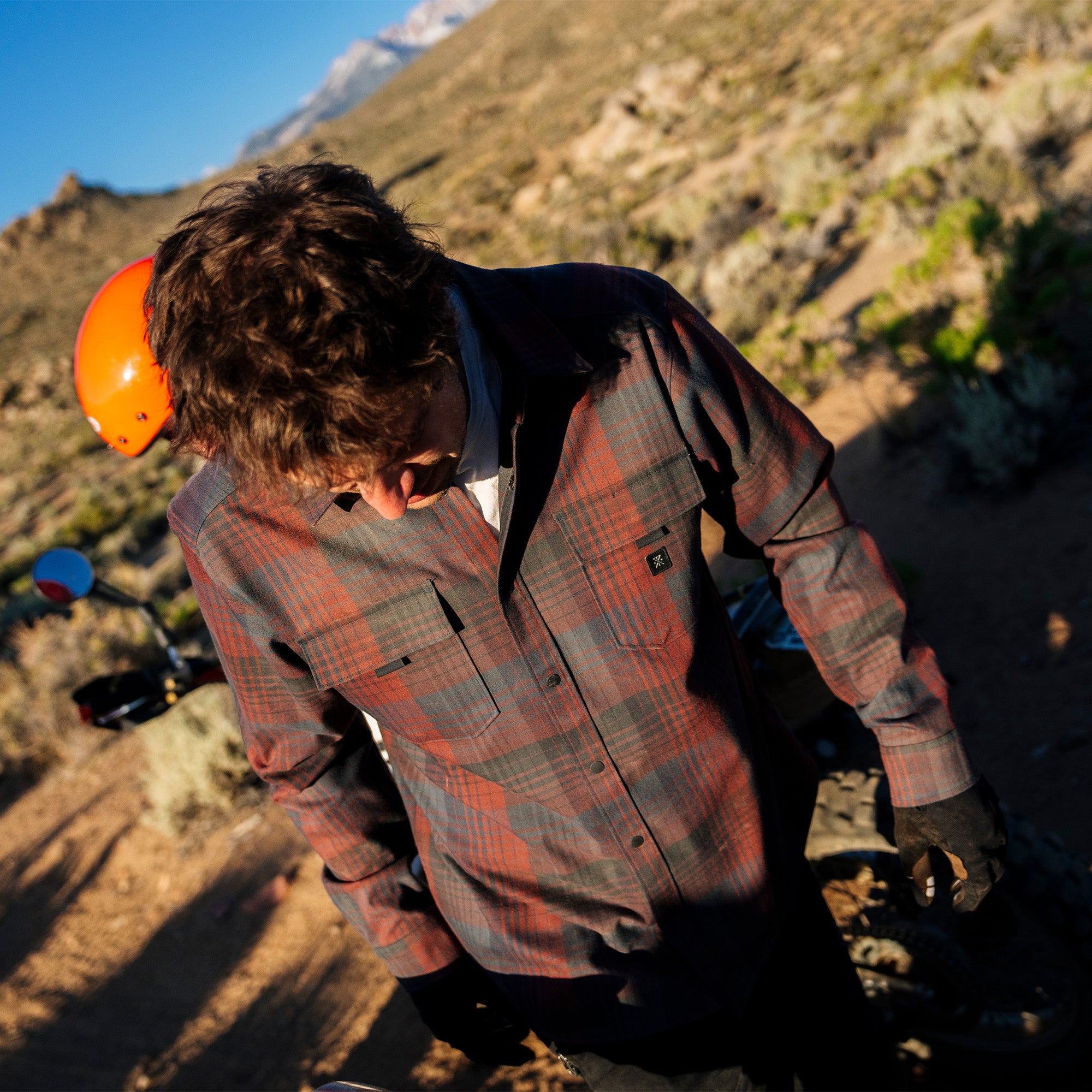 Brown and tartan plaid Diablo long sleeve flannel shirt with buttons, ideal for outdoor adventures and travel