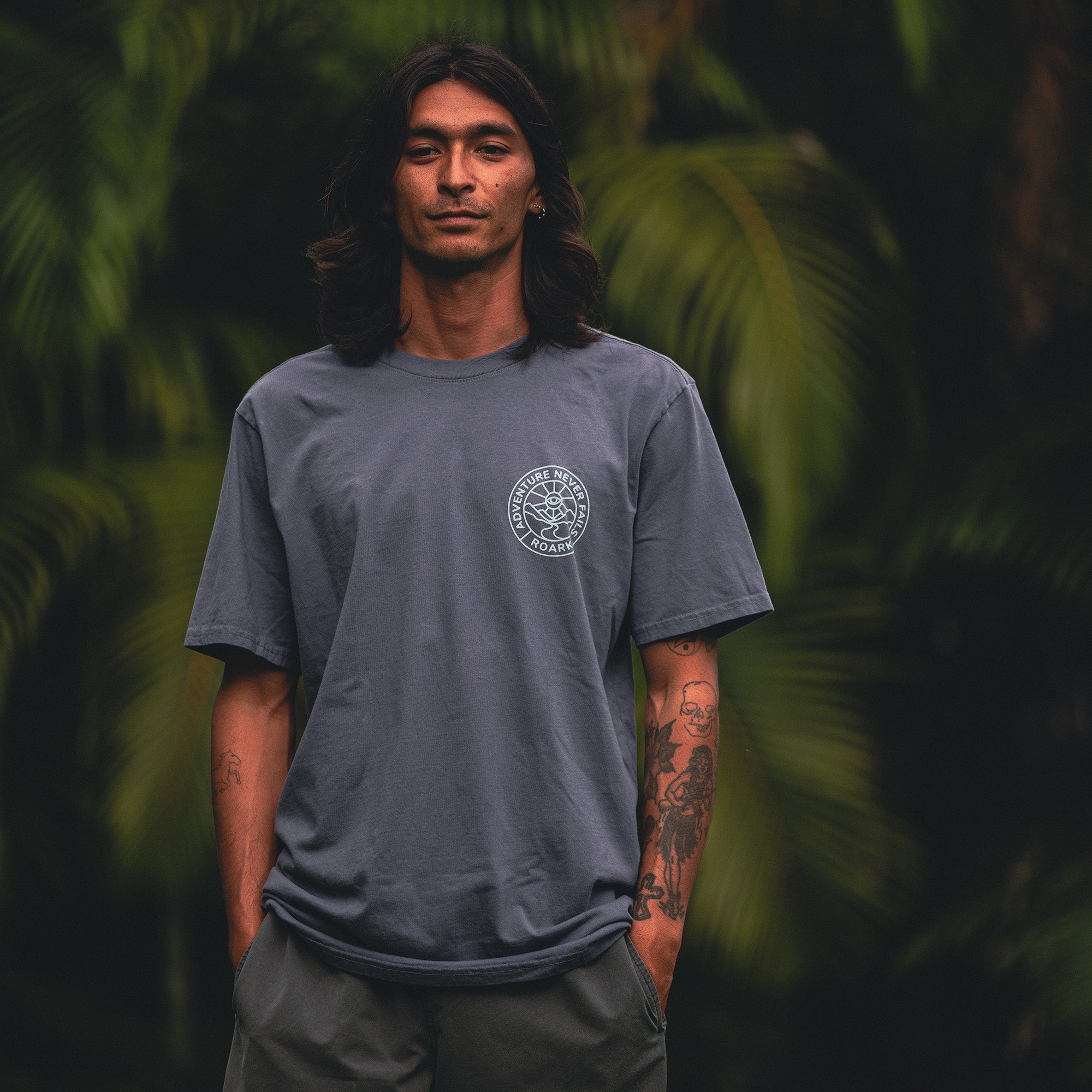 Close-up of Roark's Division Premium Tee SP26 featuring fine textile details, designed for an active lifestyle with a fashionable crew neck and short sleeves, perfect for outdoor adventures and travel.