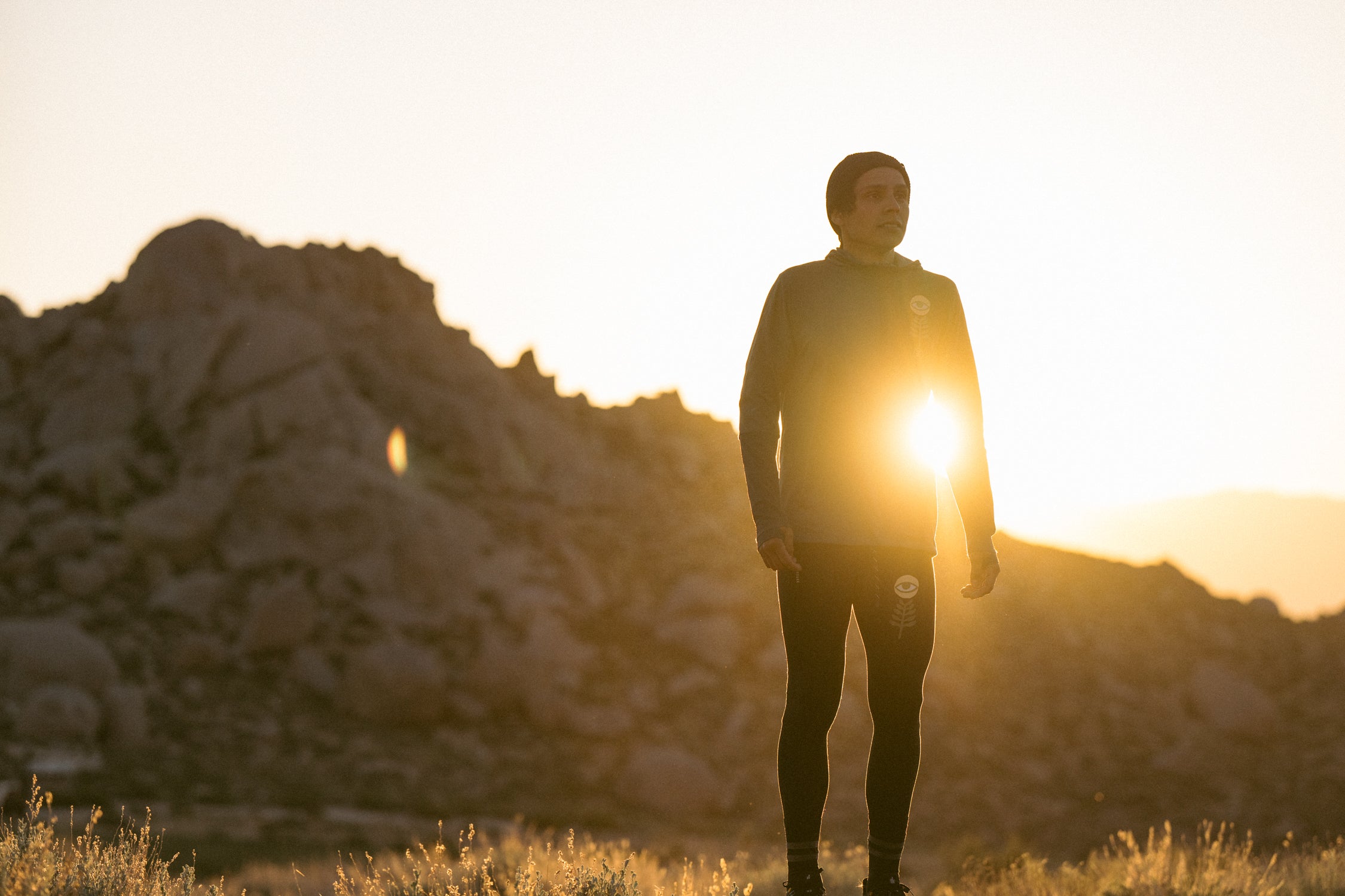 Adventurous group enjoying a breathtaking sunrise while hiking in active pants, embodying the spirit of outdoor recreation and exploration.