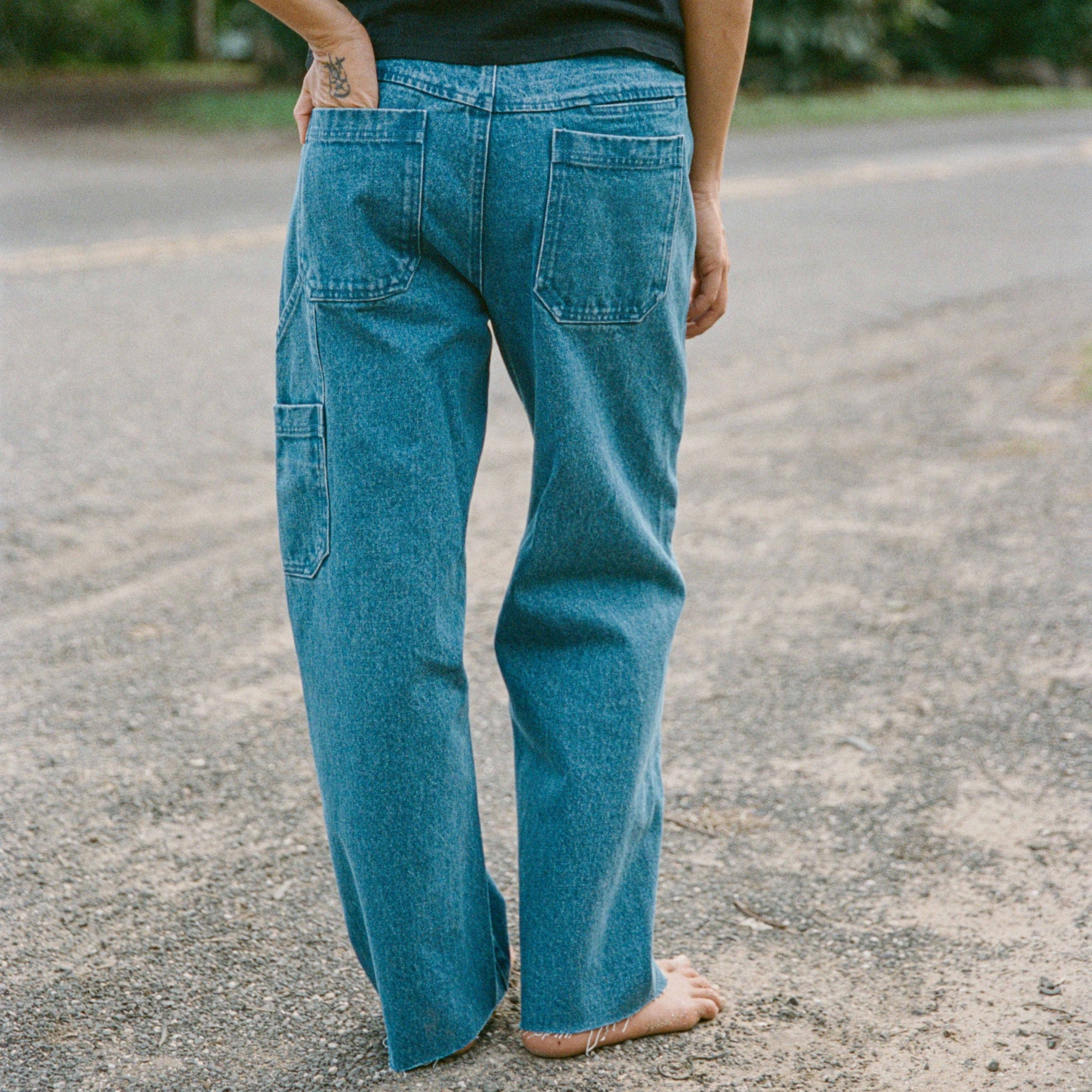 Rugged HWY 1 Denim Pant featuring detailed stitching and deep pockets, ideal for adventure and travel