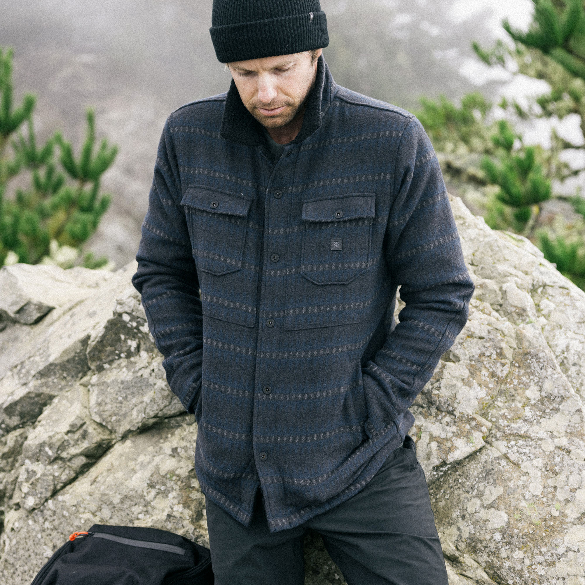 Close-up of a textured woolen Hebrides Jacket by Roark, designed for rugged outdoor adventures and travel.
