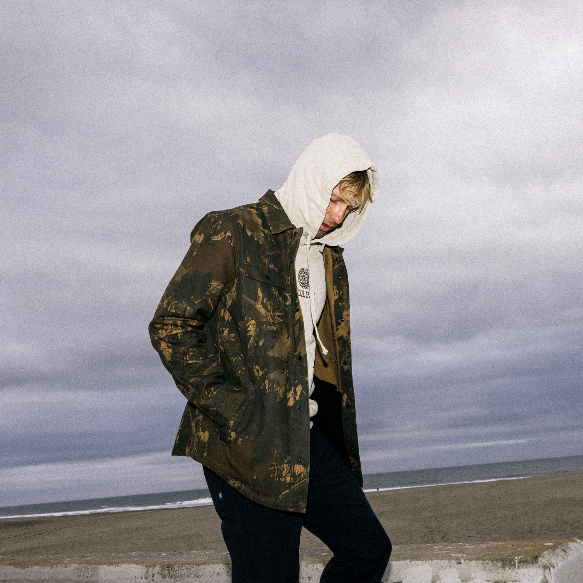 Roark Hebrides Unlined Camouflage Jacket featuring a hood and parka-style design, ideal for windy winter adventures.