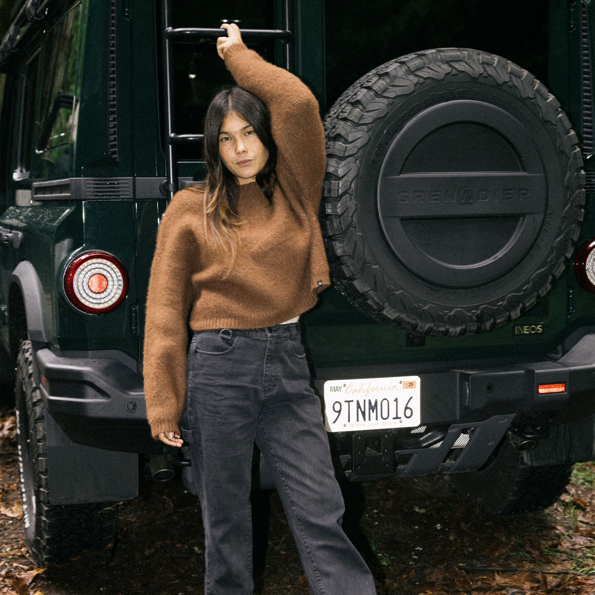 Stylish Roark Kos Sweater from Holiday 2025 collection, featuring adventure-ready rugged denim design with unique bumper and fender textures, perfect for travel and outdoor activities.