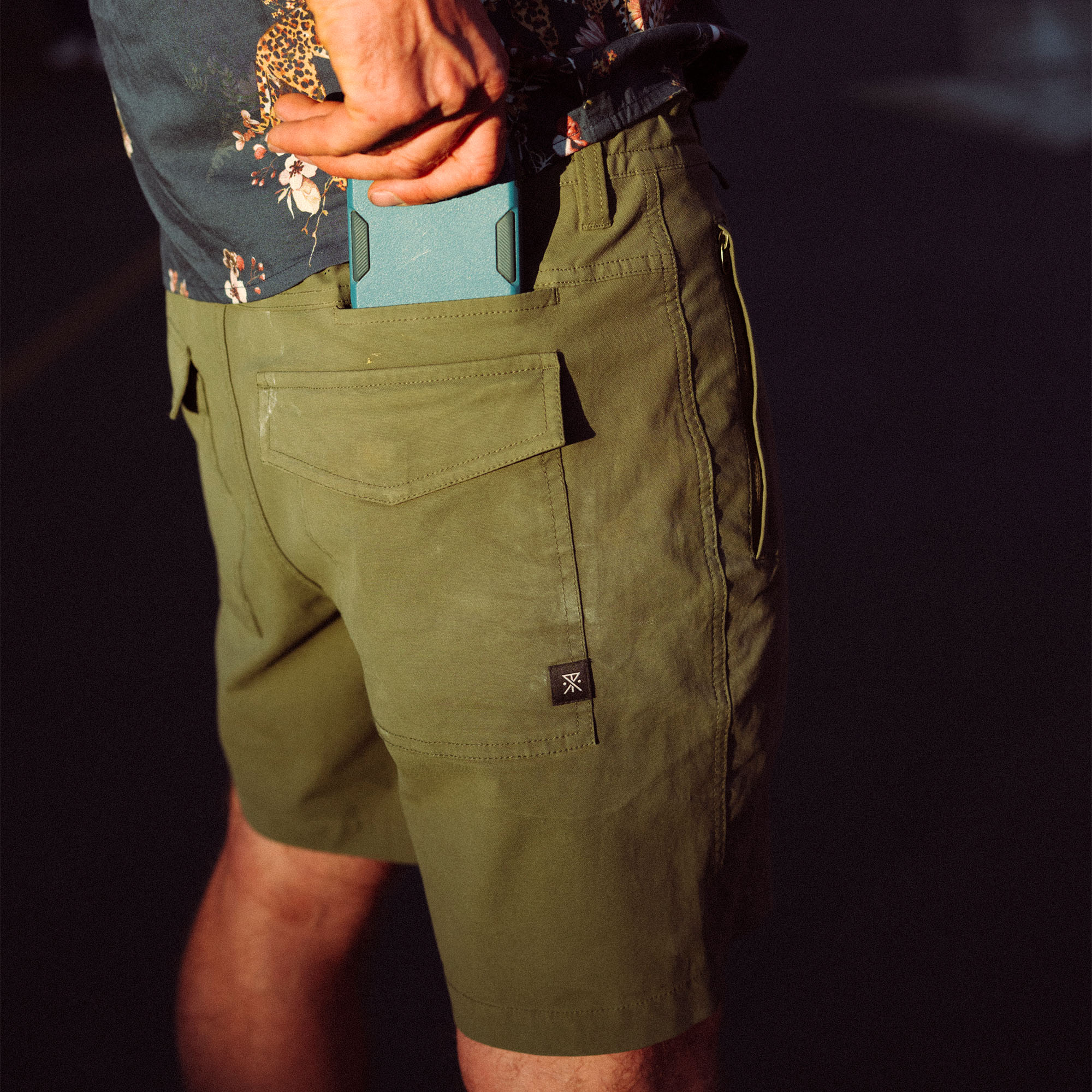Bermuda shorts designed for adventure, ideal for travel and outdoor activities, from Roark's FA25 collection.
