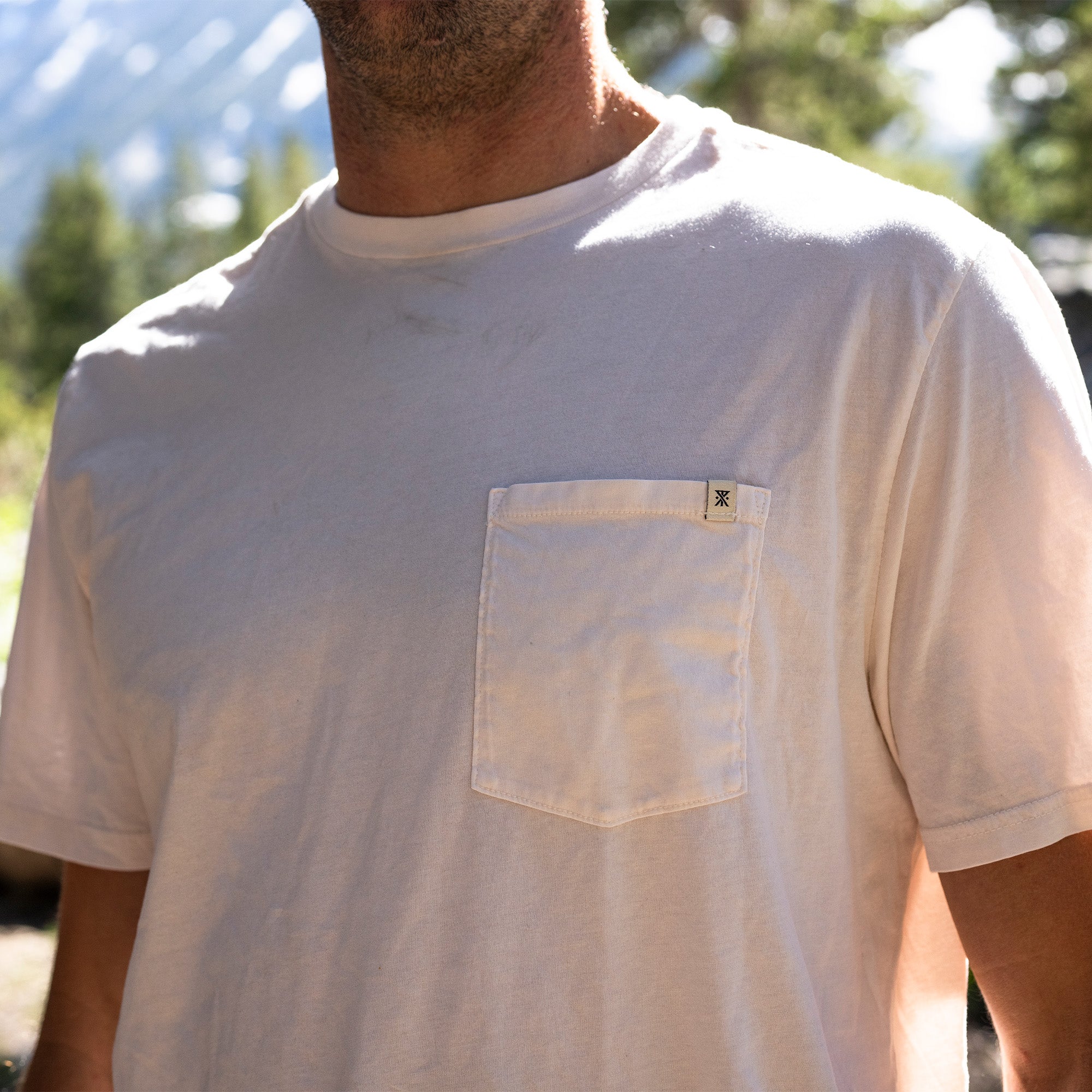 Close-up of the Roark Made To Fade Tee featuring unique fade design, ideal for outdoor and travel enthusiasts.