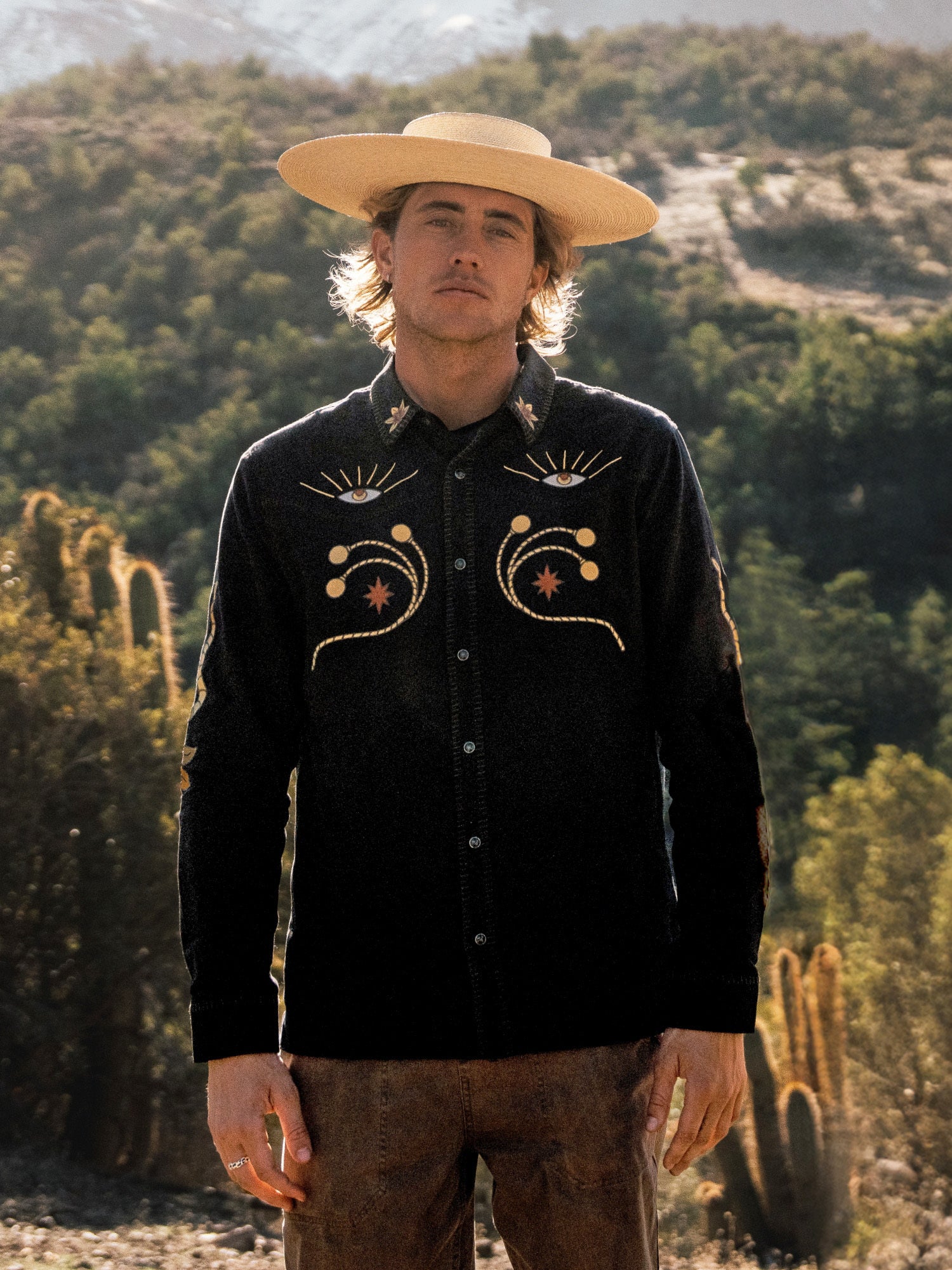 Assorted collection of adventure-ready hats including sun hats, cowboy hats, and fedoras, perfect for travel and outdoor activities