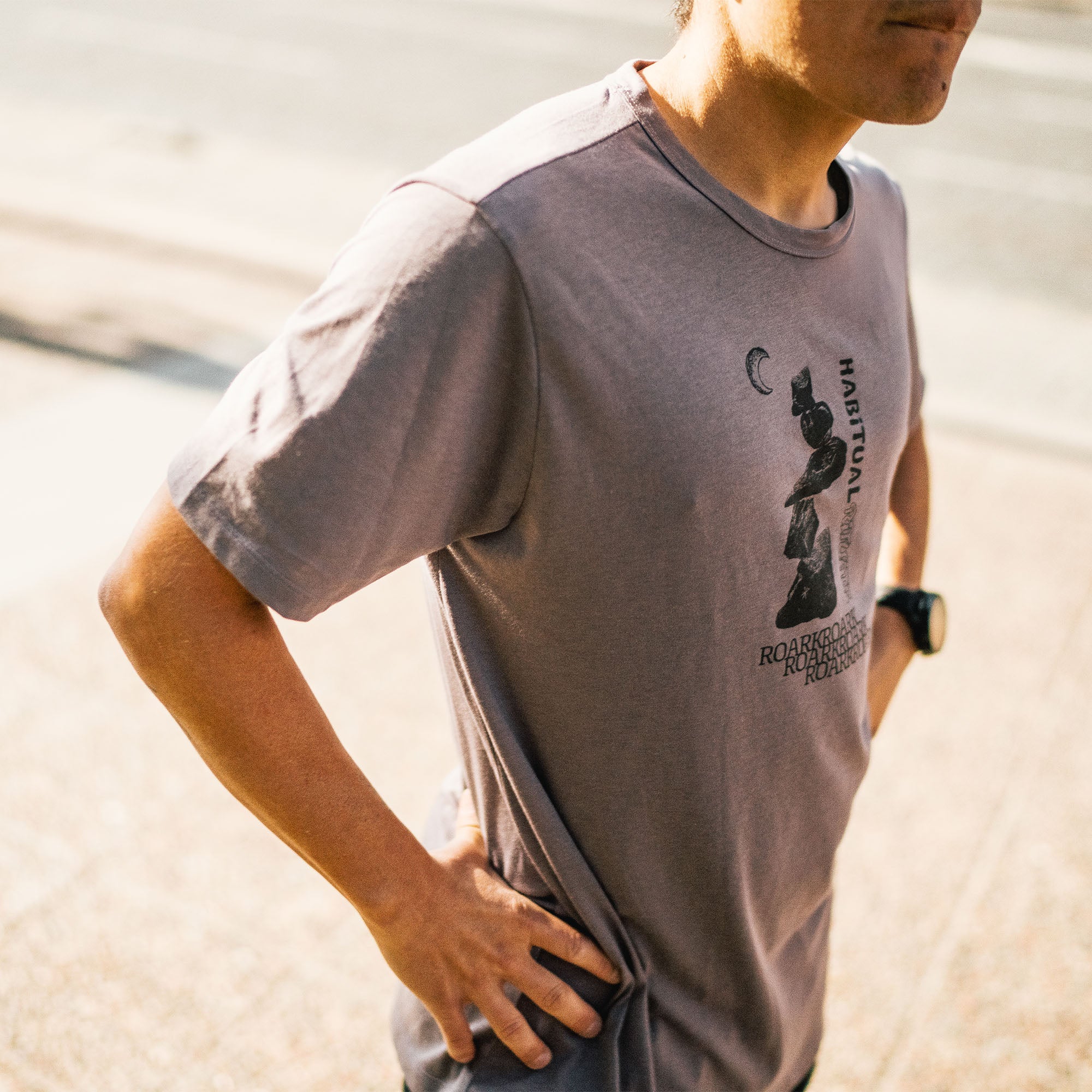 Model wearing a Roark Mathis Active Short Sleeve Tee from the Fall 2025 collection, designed for outdoor adventures and active travel.