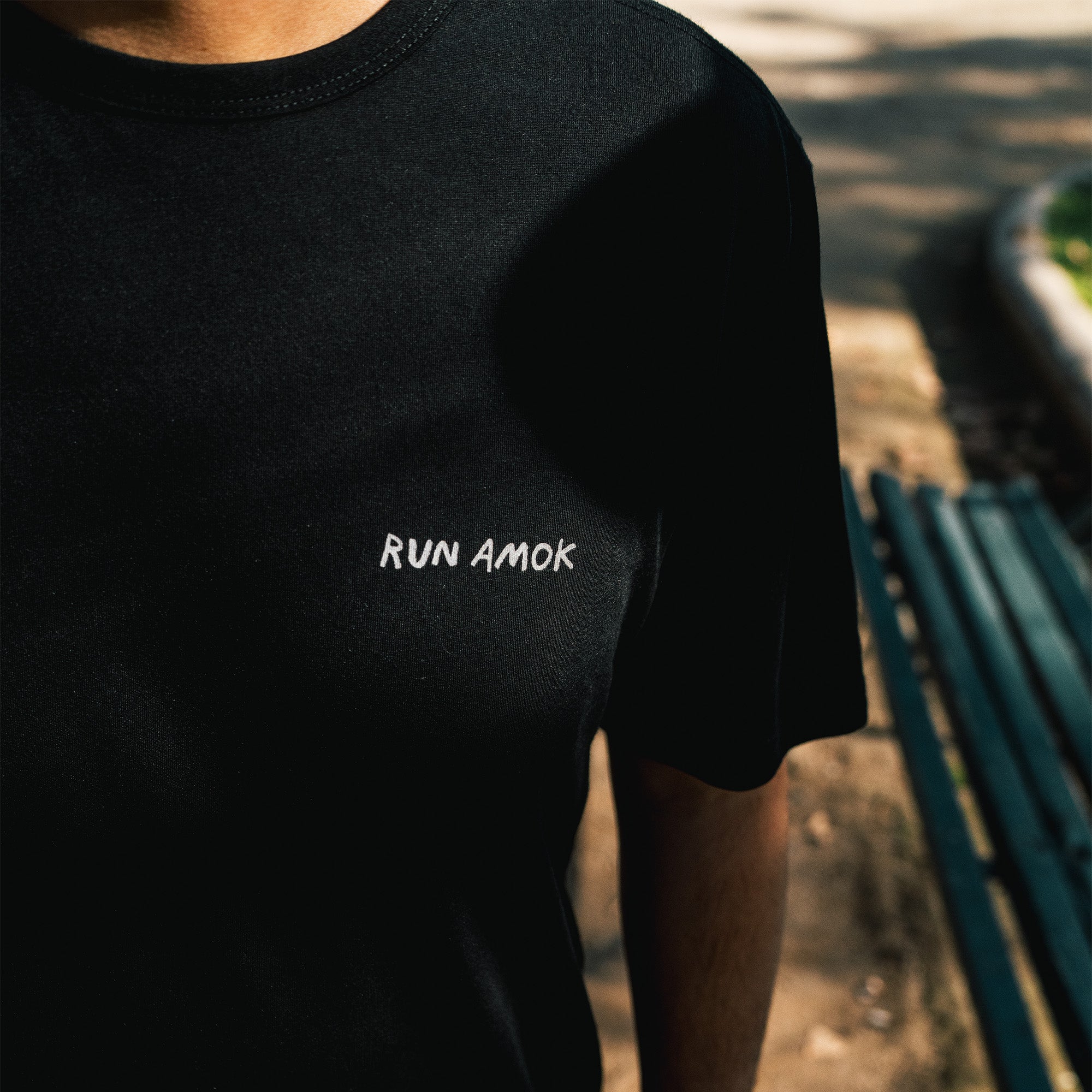 Back view of a person wearing Roark Mathis Active Short Sleeve Tee featuring a unique design, ideal for outdoor activities and travel adventures.