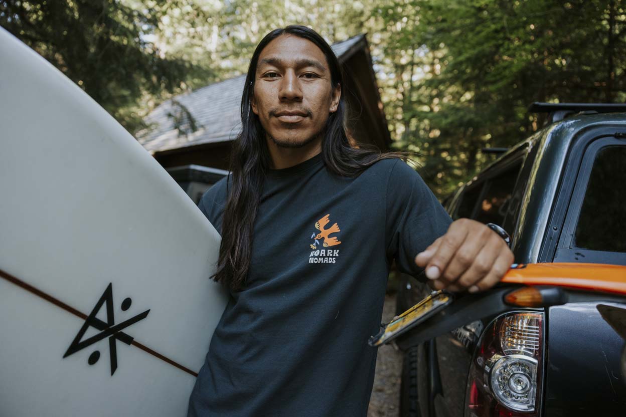 Model wearing a Roark Nomads Premium Tee in a classic fit, showcasing the relaxed, casual vibe of the brand.