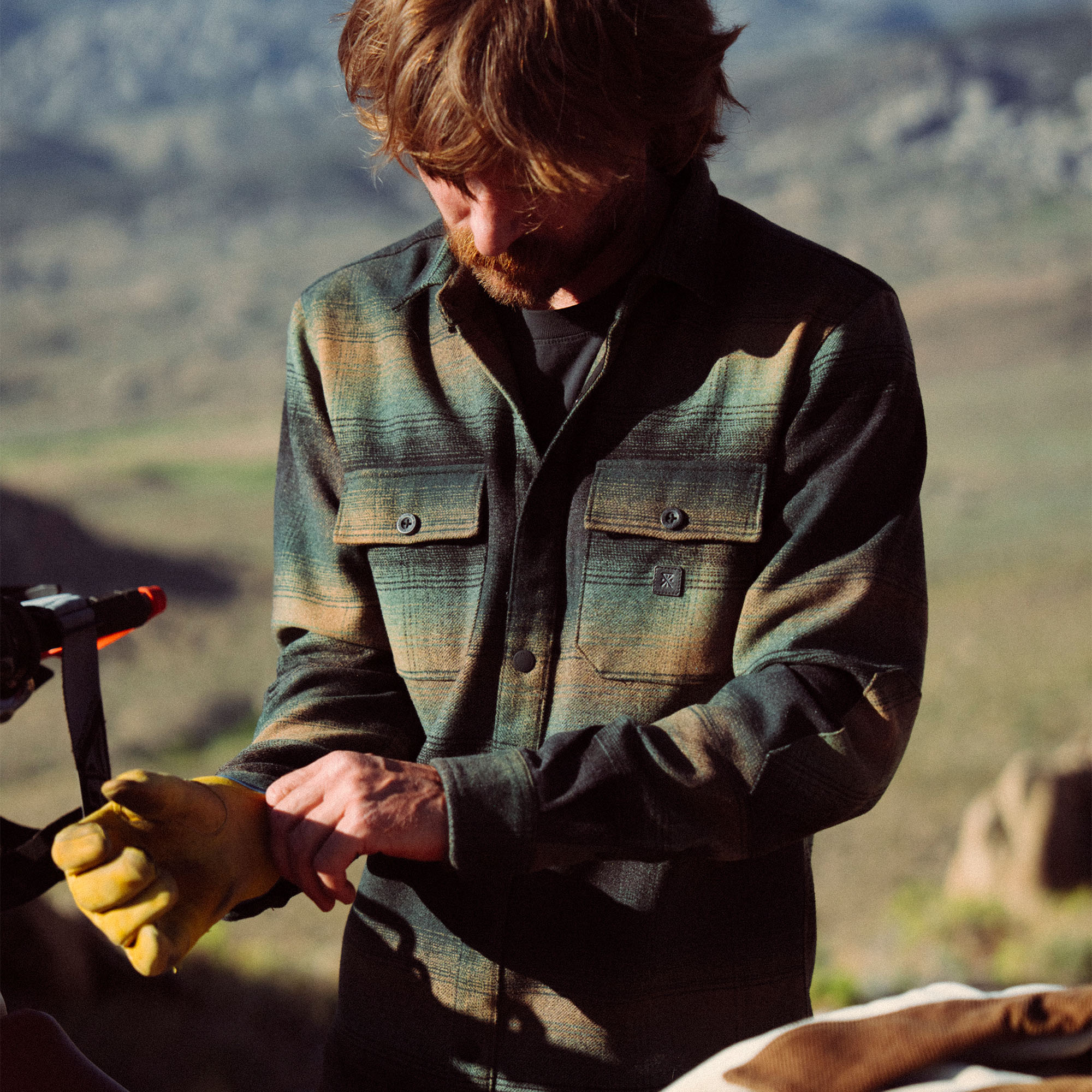 Rugged denim texture background suggestive of adventure and outdoor travel, perfect for embodying the spirit of Roark's Nordsman Long Sleeve Flannel.