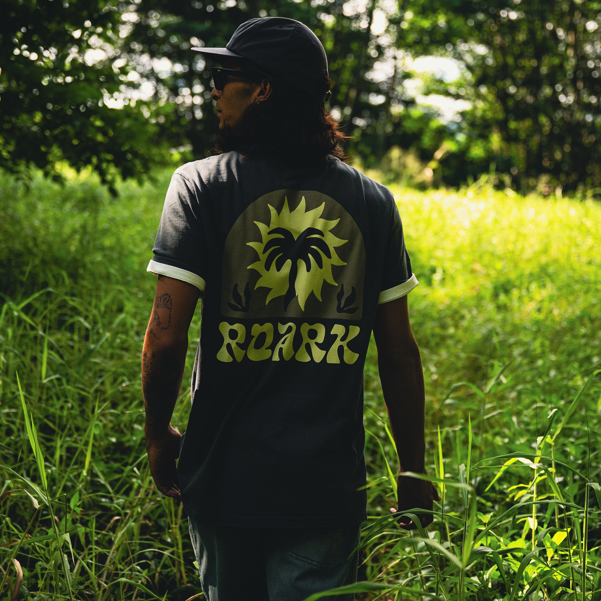 Active Palm Premium T-shirt from Roark featuring vibrant palm design, ideal for adventure and travel.