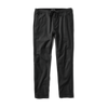 Roark Layover Traveler Pants in Black, showcasing a close-up of the front of the pants.