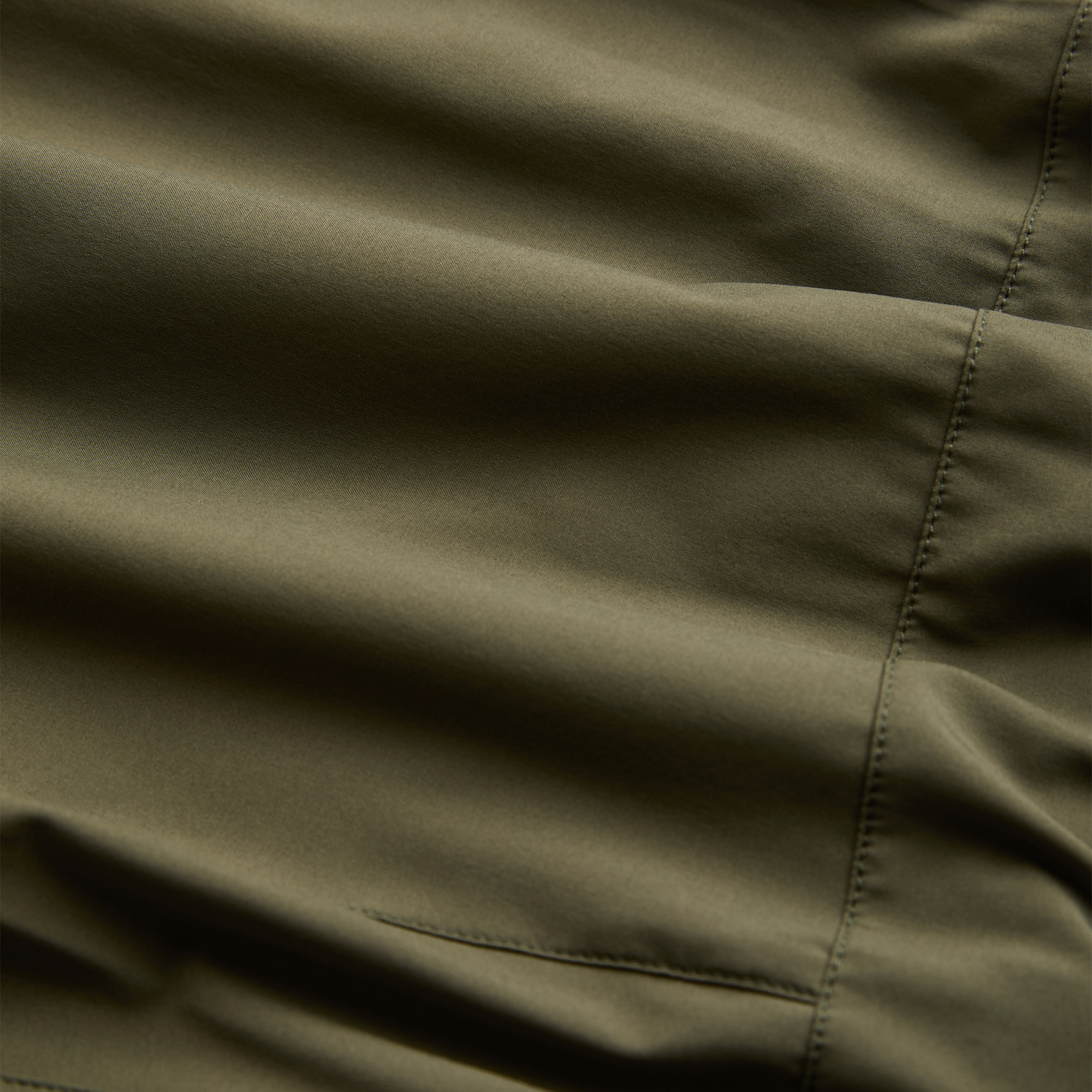 Roark outdoor adventure gear in a rustic setting, showcasing durability and style.