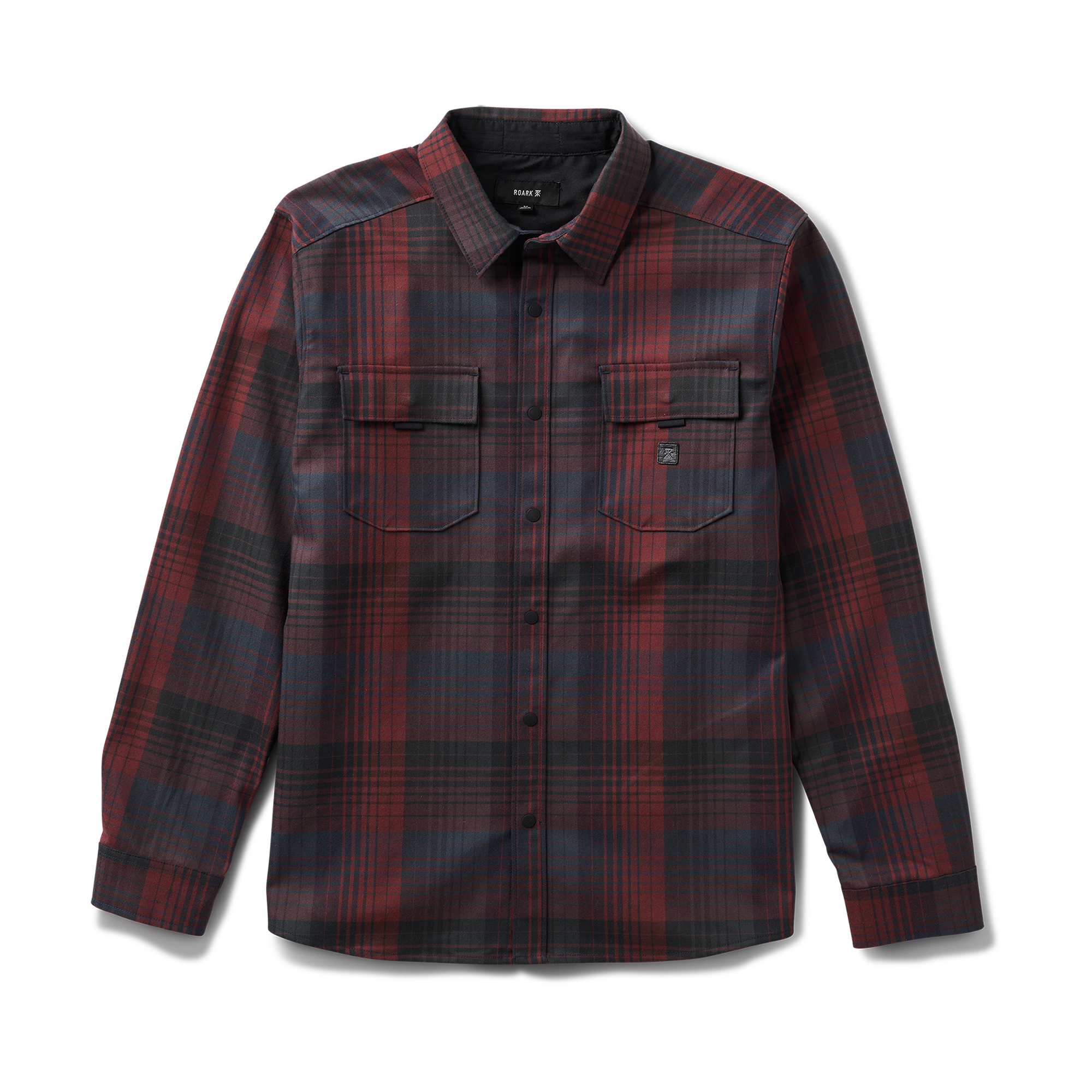 Stylish Roark plaid dress shirt featuring tartan design and pocket, perfect for adventure and outdoor settings