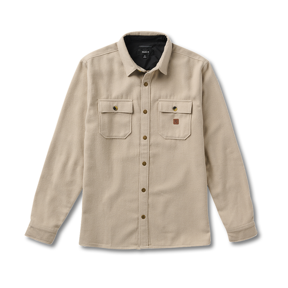 Roark adventure gear in action, showcasing durable and stylish outdoor apparel for rugged terrains.