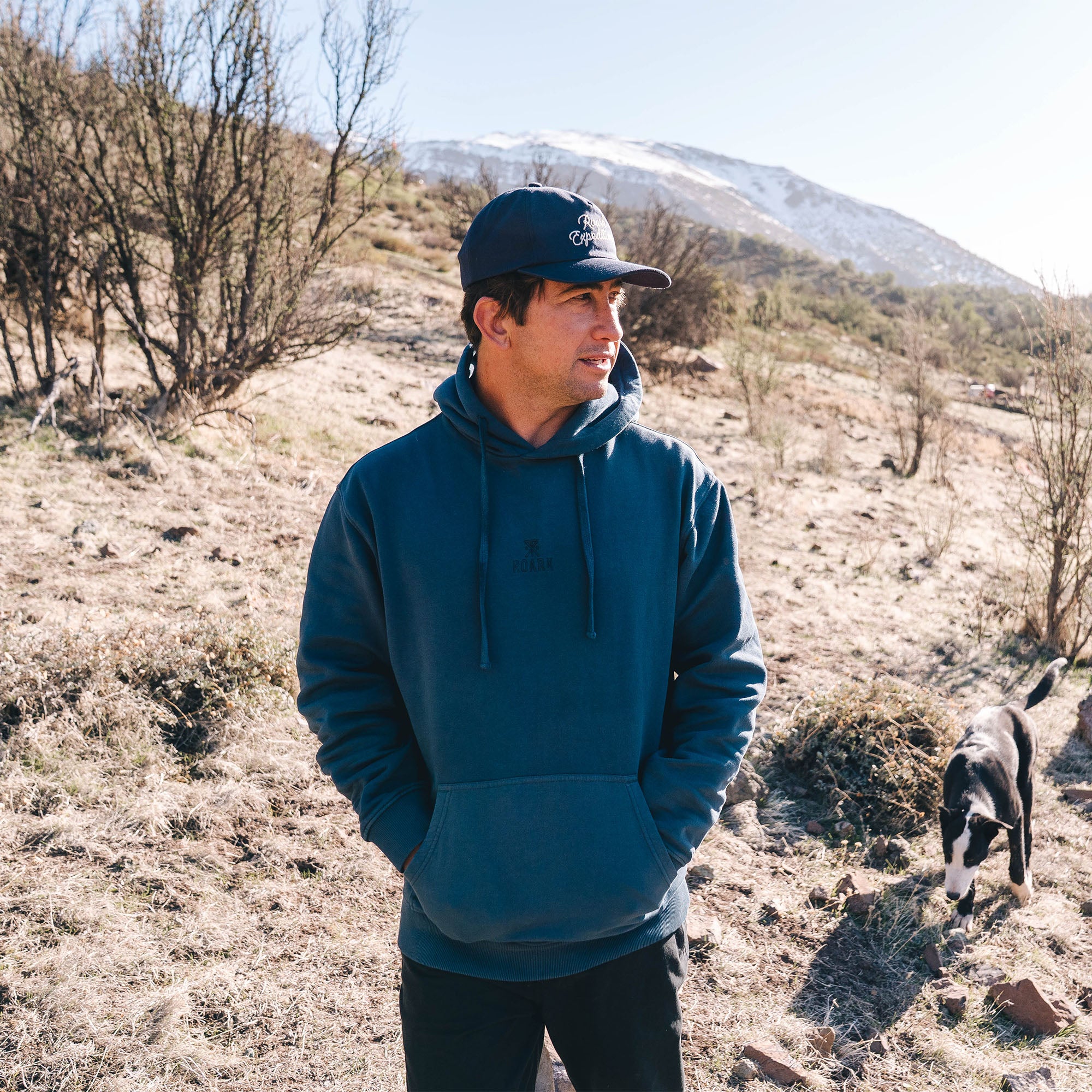 Close-up of Roark's Safe Camp Embroidery Fleece featuring detailed sleeve and hood design, ideal for outdoor adventures and leisure activities.