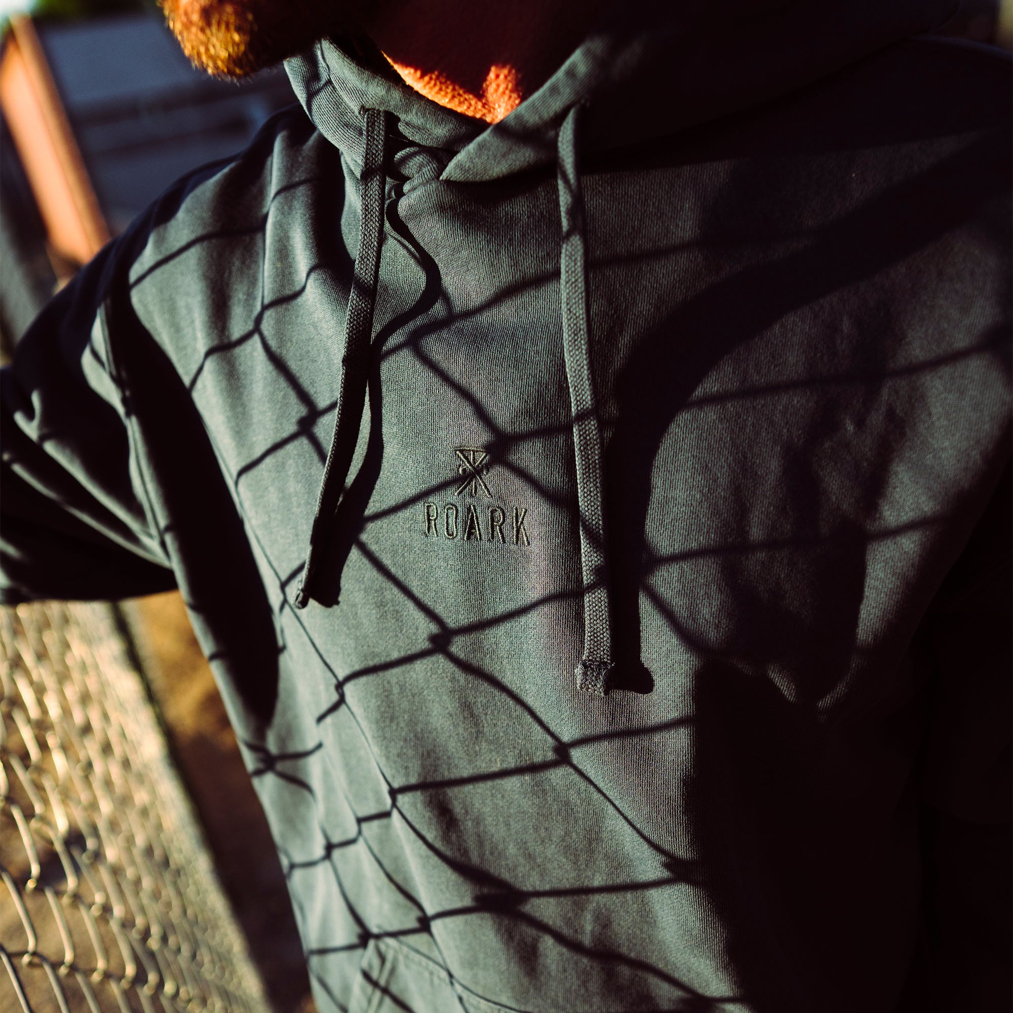 Embroidered Safe Camp fleece hoodie with sleeves and hood, designed for comfort and adventure, from Roark's Fall Collection.