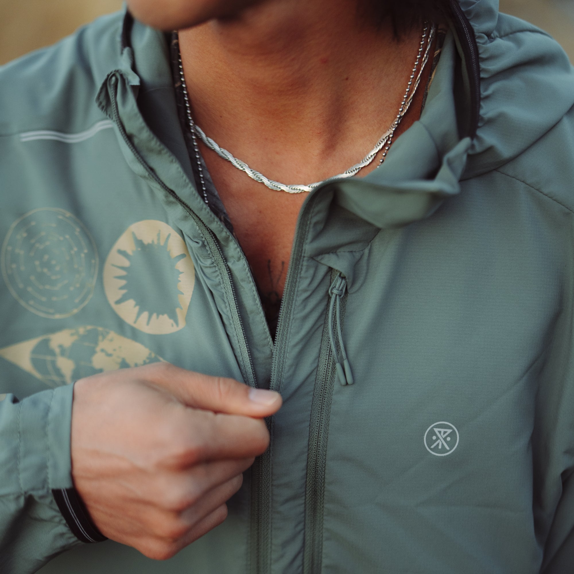 Close-up of the Roark Secondwind 3.0 Jacket showing details on the sleeve, collar, and pocket, designed for outdoor adventures.
