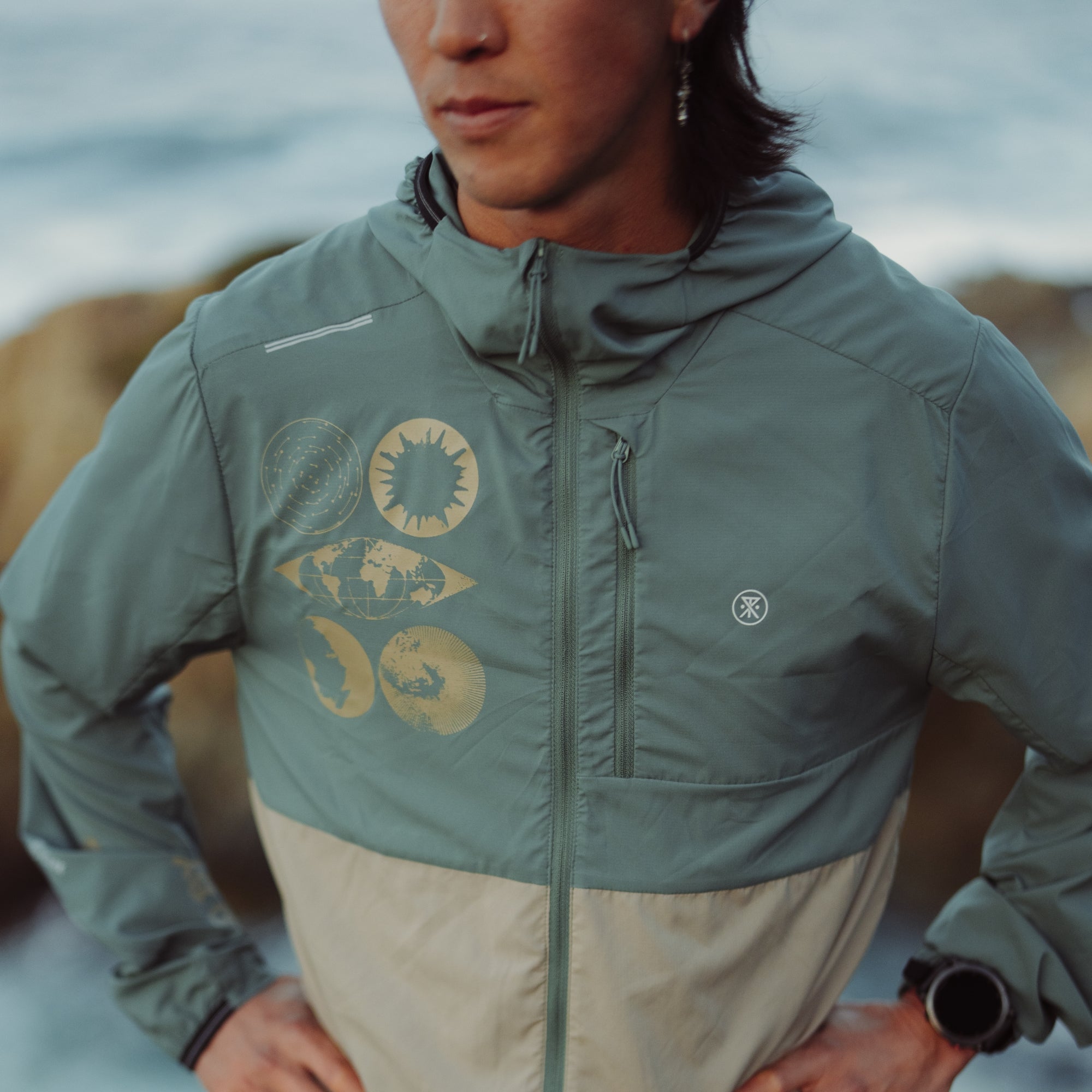 Close-up of the Secondwind 3.0 Jacket featuring a hood and windbreaker design, ideal for outdoor adventures and travel.