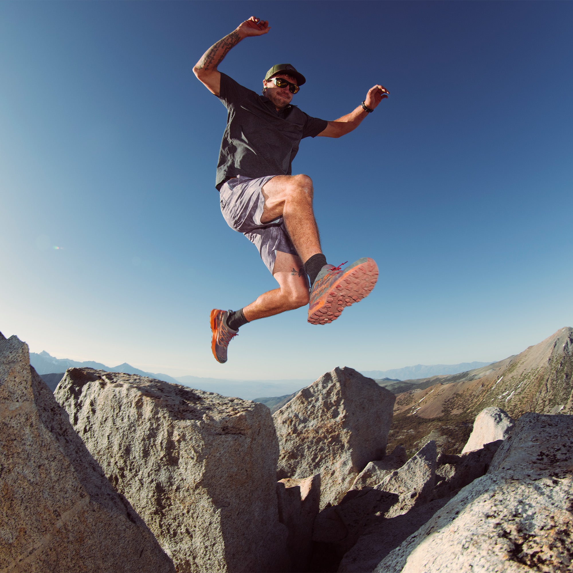 Rugged terrain featuring rocky mountains and outdoor recreation setting, perfect for adventure seekers wearing Serrano 7 Active Stretch Shorts from Roark's Fall 2025 collection.