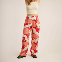 The on body view of Roark women's PIC Pants - Bright Red Vintage Crane