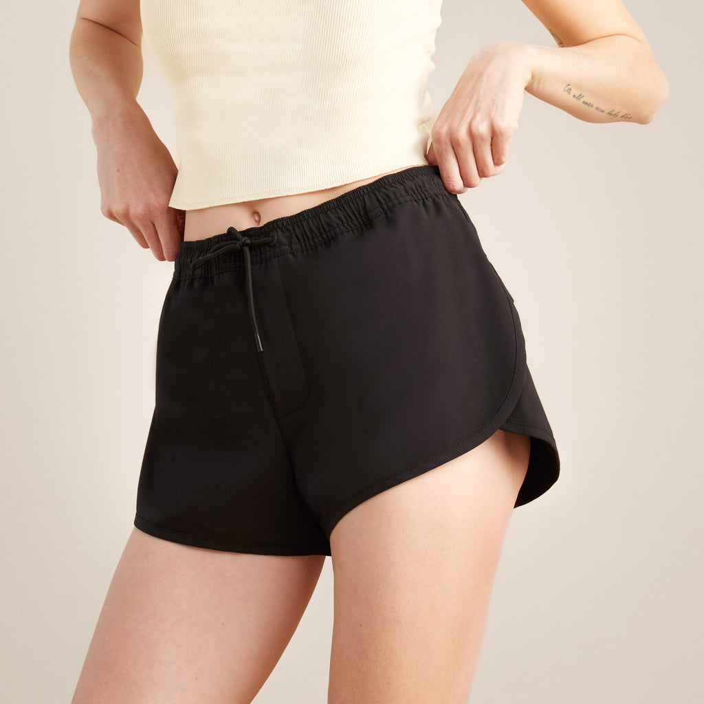 The on body view of Roark women's Overseas Shorts - Black Big Image - 1