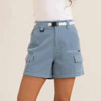 Chic blue corduroy shorts with utility pockets and white belt detail.