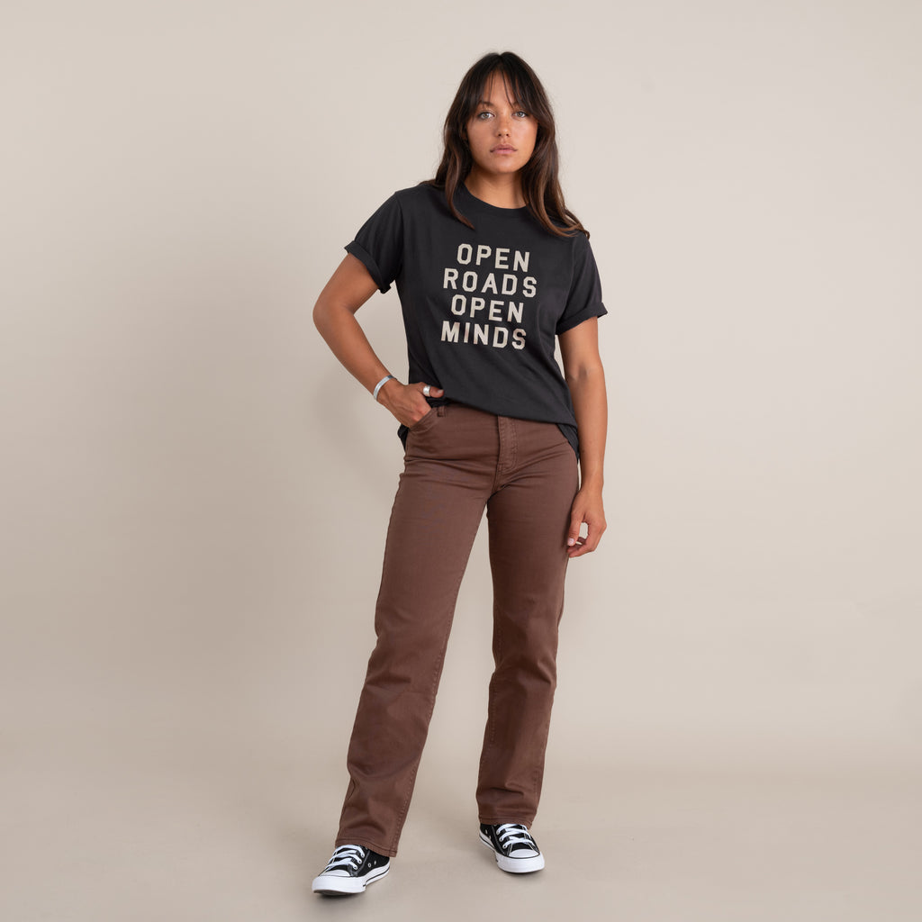 The on body view of Roark's Open Roads Open Minds tee for women. Big Image - 3