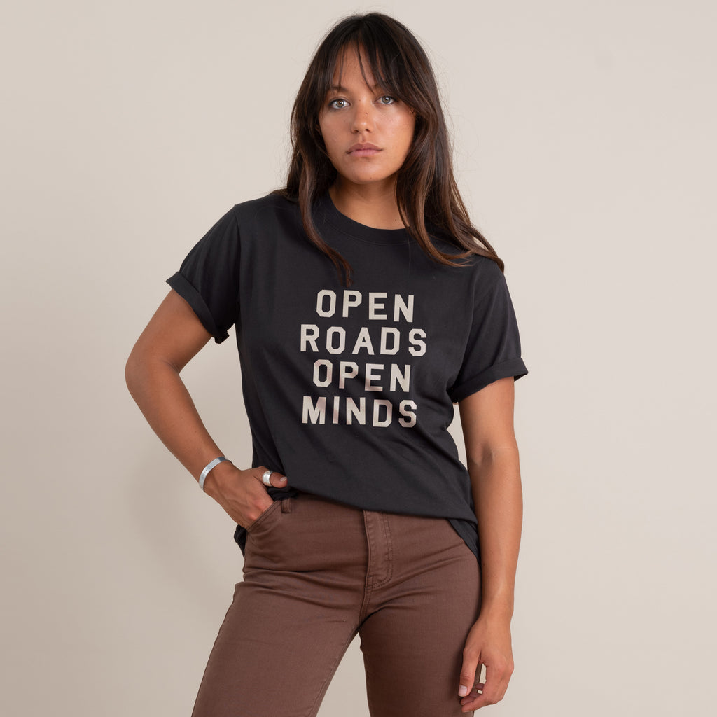 The on body view of Roark's Open Roads Open Minds tee for women. Big Image - 1