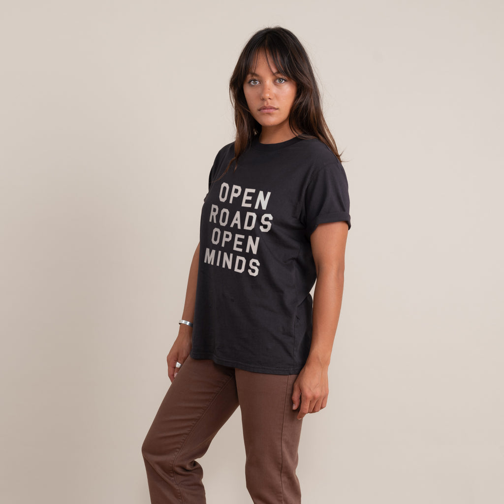 The on body view of Roark's Open Roads Open Minds tee for women. Big Image - 4